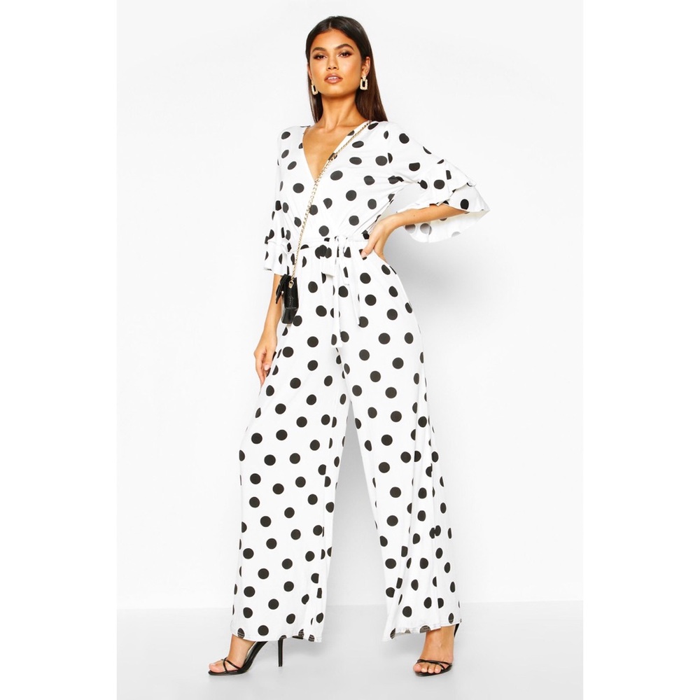 Polka dot ruffle sleeve jumpsuit. SOLD